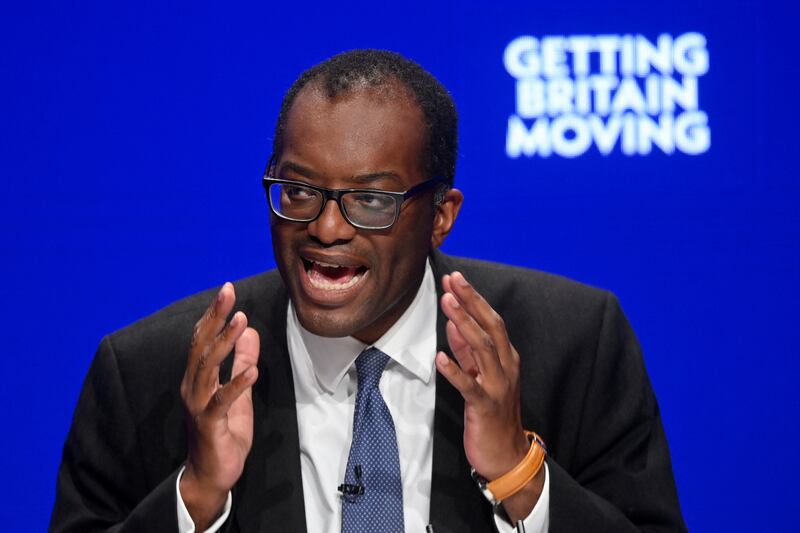 Mr Kwarteng delivers a speech on day two of the annual Conservative Party conference in Birmingham. Getty Images