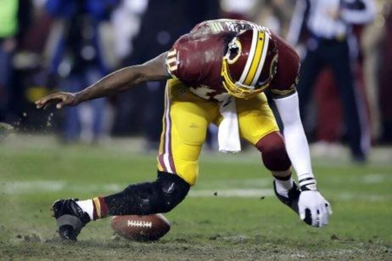 Washington Redskins quarterback Robert Griffin III injured his knee last week against Seattle Seahawks in the NFL play-offs and has had to have surgery. Matt Slocum / AP Photo
