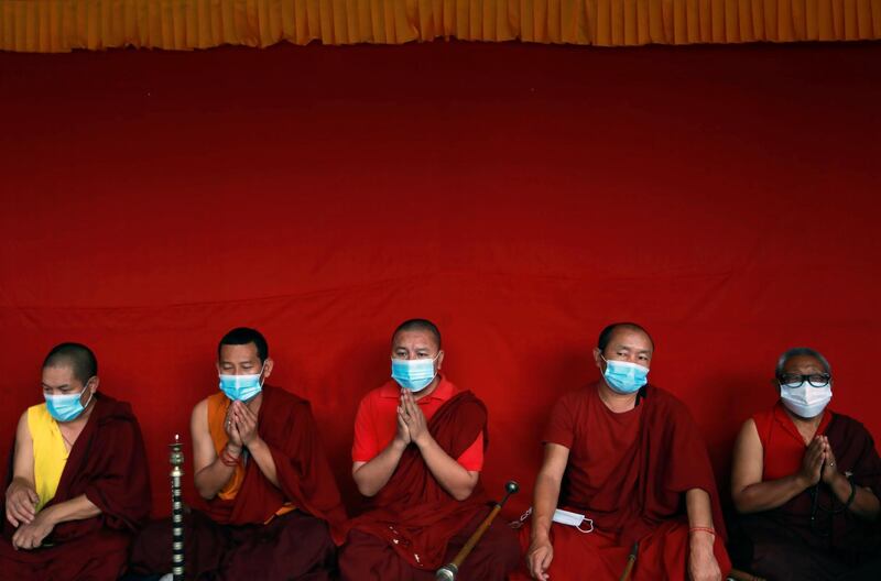 Buddhist monks offer prayer during the funeral procession of Ang Rita Sherpa also known as the "snow leopard" for his climbing skills, who climbed Everest 10 times without the use of supplement oxygen, in Kathmandu, Nepal. Reuters