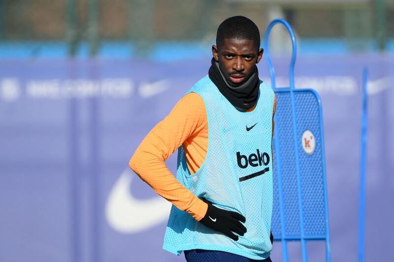 Barcelona's French forward Ousmane Dembele looks on during a training session at the Joan Gamper training ground in Sant Joan Despi near Barcelona, on January 22, 2022 on the eve of the Spanish League football match against Alaves.  - Ousmane Dembele hit back at Barcelona on January 20, 2022 by saying he "won't give in to blackmail" after the club's director of football Mateu Alemany said the winger must leave before the end of January.  (Photo by LLUIS GENE  /  AFP)