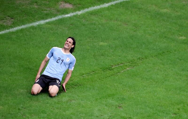 Edinson Cavani celebrates scoring for Uruguay before his goal is ruled out. Reuters