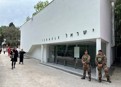 Italian soldiers are stationed outside the Israel pavilion. AP