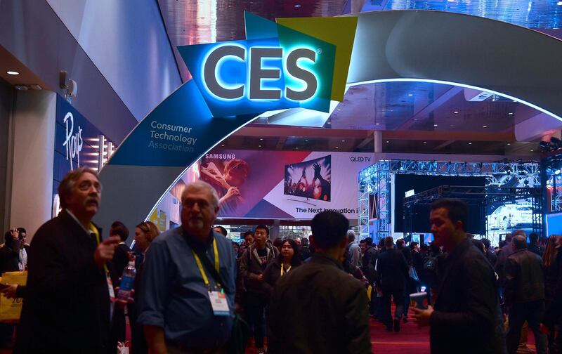 (FILES) In this file photo taken on January 7, 2017, attendees walk the halls on day three of the 2017 Consumer Electronic Show (CES) in Las Vegas, Nevada. Amid trade wars, geopolitical tensions and a decline in public trust, the technology sector is seeking to put its problems aside with the Consumer Electronics Show, the annual extravaganza showcasing futuristic innovations. The January 8 January 11, 2019 Las Vegas trade event offers a glimpse into new products and services designed to make people's lives easier, fun and more productive, reaching across diverse sectors such as entertainment, health, transportation, agriculture and sports. / AFP / Frederic J. BROWN
