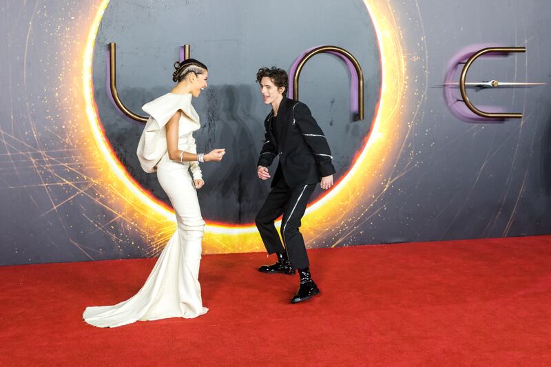 Zendaya and Chalamet have some fun on the red carpet. EPA