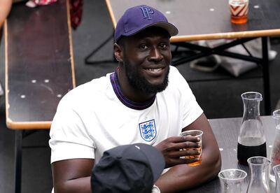 England fan and rapper Stormzy watches the English victory at Wembley in London on June 29.