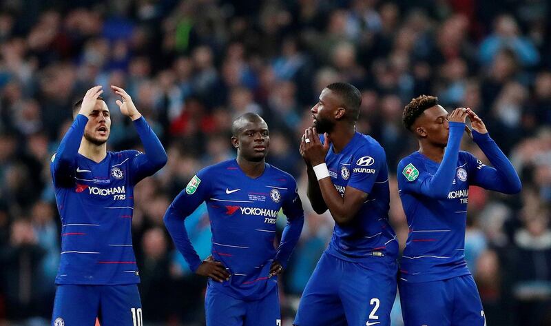 Chelsea players react during the penalty shootout. Action Images via Reuters