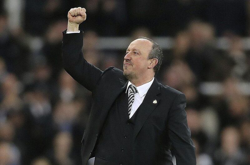 Newcastle United manager Rafael Benitez salutes the fans after victory over Preston North End sealed promotion back to the Premier League. Owen Humphreys/ PA