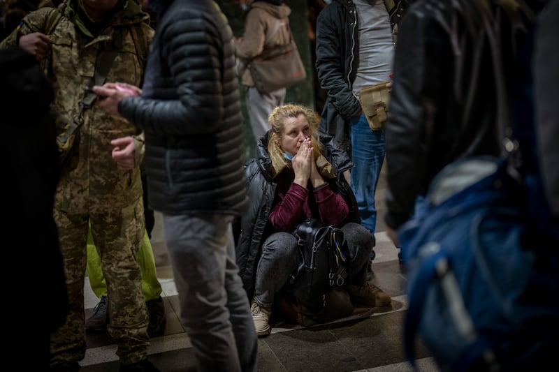 An anxious wait to board a train to leave Kiev as the attack loomed. AP Photo