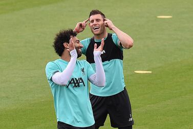 LIVERPOOL, ENGLAND - JUNE 19: (THE SUN OUT. THE SUN ON SUNDAY OUT) Mohamed Salah of Liverpool with James Milner of Liverpool during a training session at Melwood Training Ground on June 19, 2020 in Liverpool, England. (Photo by John Powell/Liverpool FC via Getty Images)
