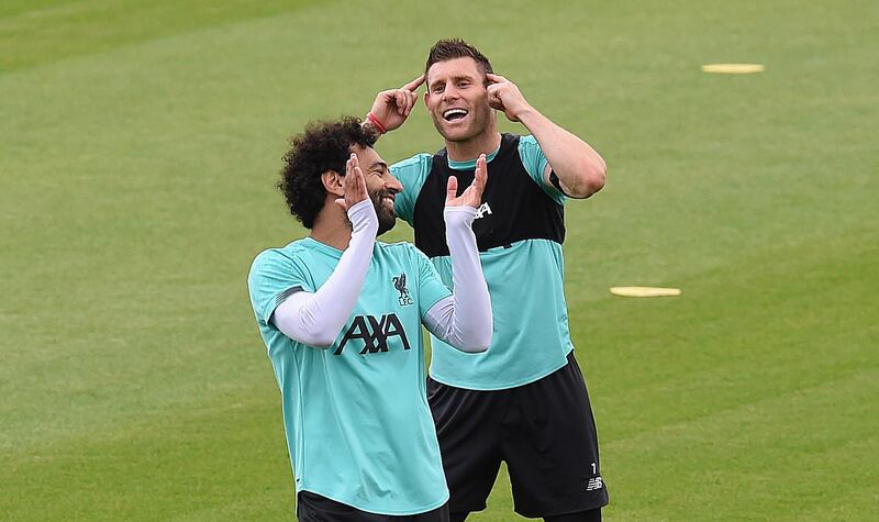 LIVERPOOL, ENGLAND - JUNE 19: (THE SUN OUT. THE SUN ON SUNDAY OUT) Mohamed Salah of Liverpool with James Milner of Liverpool during a training session at Melwood Training Ground on June 19, 2020 in Liverpool, England. (Photo by John Powell/Liverpool FC via Getty Images)