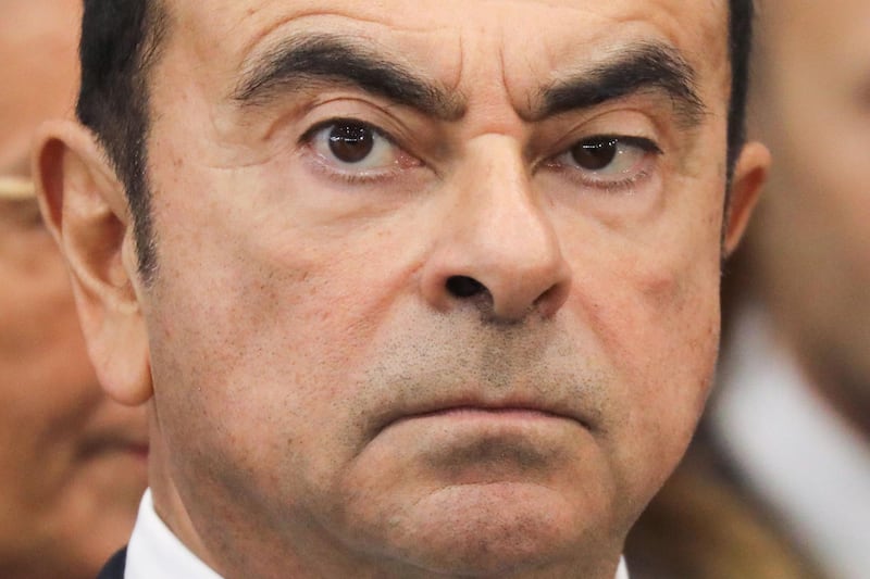 (FILES) In this file photo taken on November 8, 2018 Chairman and CEO of Renault-Nissan-Mitsubishi Carlos Ghosn looks on during a visit of the French President at the Renault factory, in Maubeuge, northern France. Two lawyers defending former Nissan chief Carlos Ghosn on charges of financial misconduct submitted their resignations on February 13, 2019, their law firm said in a statement. - 
 / AFP / Ludovic MARIN
