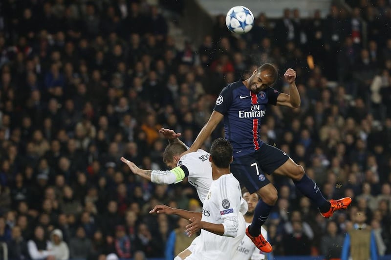 Paris Saint-Germain’s Lucas Moura heasd the ball against Real Madrid in their Champions League match on Wednseday night at the Parc des Princes. Thomas Samson / AFP