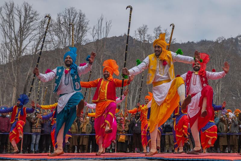 Indian paramilitary soldiers perform a dance as they take part in Indian Republic day celebration in Srinagar, Indian controlled Kashmir. AP