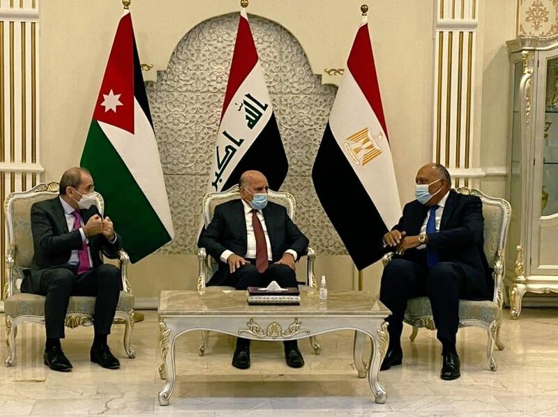 Iraqi Foreign Minister Fuad Hussein, centre, and his Egyptian and Jordanian counterparts, Sameh Shoukry and Ayman Safadi. MFA Egypt
