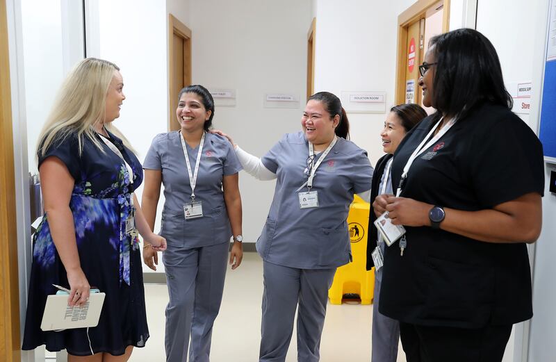 Ms Fitzgibbons meets nursing staff in the school's sports clinic