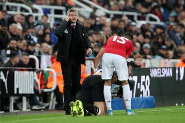 Manchester United manager Ole Gunnar Solskjaer, left, is under pressure at Old Trafford as his side sits 12th in the Premier League. Getty