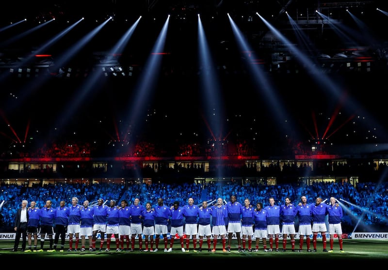 The France 98 team lines up before the match. This summer marks 20 years since the nation's World Cup triumph. Gonzalo Fuentes / Reuters