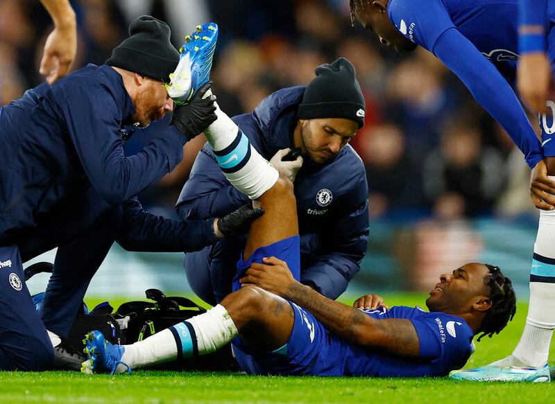 Raheem Sterling receives medical attention. Reuters