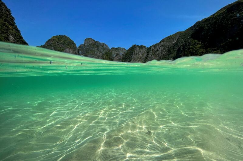 This partially underwater shot shows the clear waters at the beach of Maya Bay in Thailand. Reuters