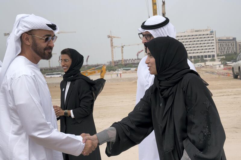 YAS ISLAND, ABU DHABI, UNITED ARAB EMIRATES - March 01, 2018: HH Sheikh Mohamed bin Zayed Al Nahyan, Crown Prince of Abu Dhabi and Deputy Supreme Commander of the UAE Armed Forces (L), greets HE Maryam Eid Al Mheiri, CEO of Media Zone Authority & and twofour54 (R), during the inspection of the urban development and tourism projects, at Yas Bay. Seen with HE Mohamed Khalifa Al Mubarak, Chairman of the Department of Culture and Tourism and Abu Dhabi Executive Council Member (2nd R) and HE Noura Mohamed Al Kaabi, UAE Minister of Culture and Knowledge Development (3rd R).

( Mohamed Al Hammadi / Crown Prince Court - Abu Dhabi )
---