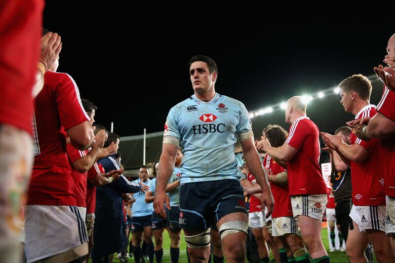 SYDNEY, AUSTRALIA - JUNE 15: Waratahs captain David Dennis and team mates walk off the field after losing the match between the Waratahs and the British & Irish Lions at Allianz Stadium on June 15, 2013 in Sydney, Australia.  (Photo by Cameron Spencer/Getty Images) *** Local Caption ***  170601333.jpg