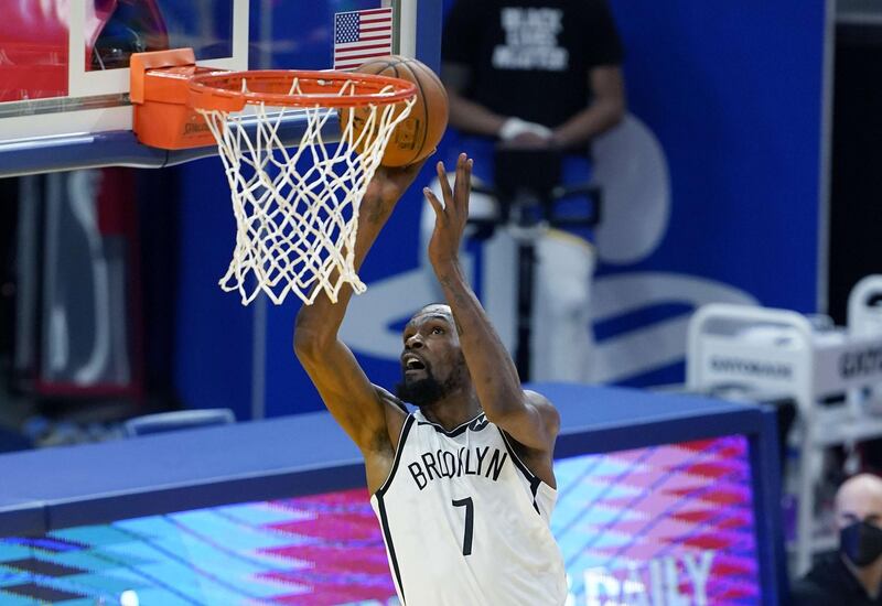 SAN FRANCISCO, CALIFORNIA - FEBRUARY 13: Kevin Durant #7 of the Brooklyn Nets goes in for a layup against the Golden State Warriors during the second half of an NBA basketball game at Chase Center on February 13, 2021 in San Francisco, California. NOTE TO USER: User expressly acknowledges and agrees that, by downloading and or using this photograph, User is consenting to the terms and conditions of the Getty Images License Agreement.   Thearon W. Henderson/Getty Images/AFP
== FOR NEWSPAPERS, INTERNET, TELCOS & TELEVISION USE ONLY ==
