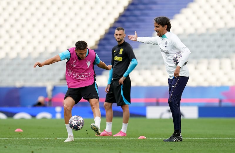 Inter Milan manager Simone Inzaghi oversees training at the Ataturk Olympic Stadium in Istanbul. PA
