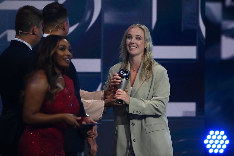 England and Arsenal forward Beth Mead receives an award for the Fifa Fifpro Women's World 11. AFP