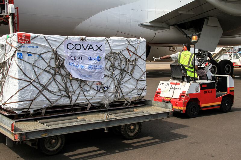 A batch of Covax medicine arrives in Uganda but the global vaccination campaign has called for additional financing. AFP