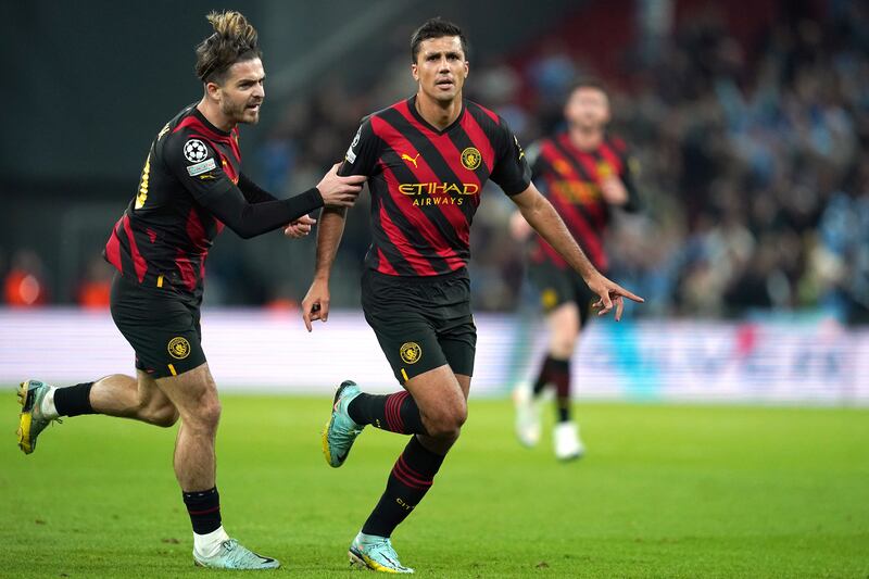 Manchester City's Rodri, right, celebrates scoring a goal that was disallowed by VAR. PA