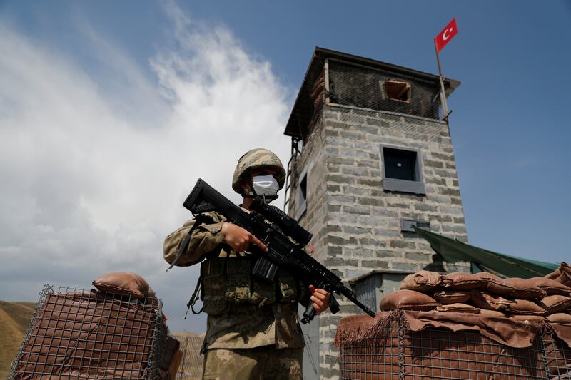 A Turkish soldier guards a military post on the Turkish-Iranian border in Van province, Turkey. Reuters