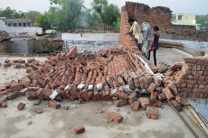 A collapsed wall in Agra,  Uttar Pradesh state. AFP Photo