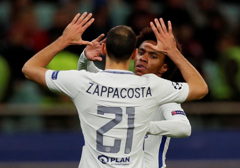 Willian celebrates scoring Chelsea's fourth goal with Davide Zappacosta. Peter Cziborra / Reuters