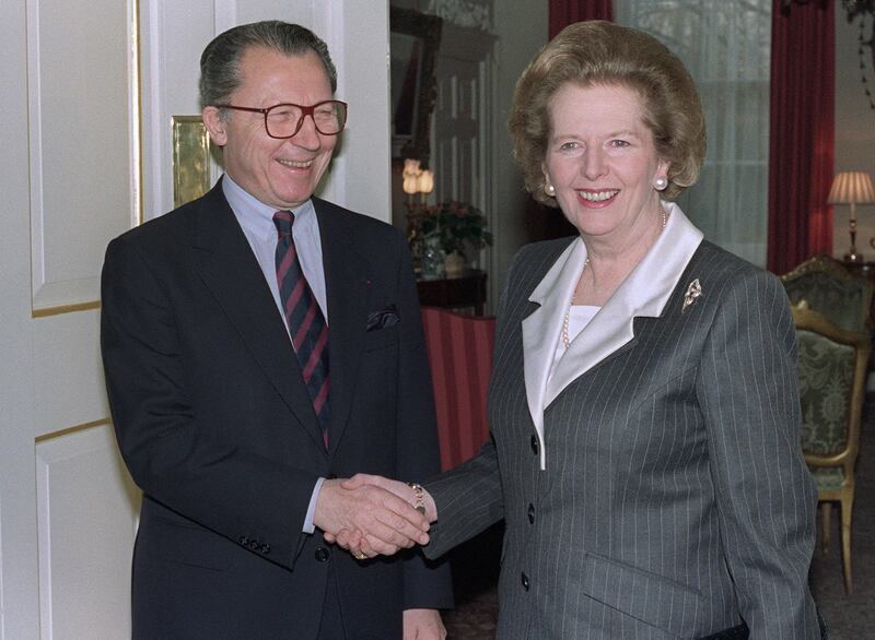 British Prime Minister Margaret Thatcher greets Mr Delors in London on December 1, 1989. AFP