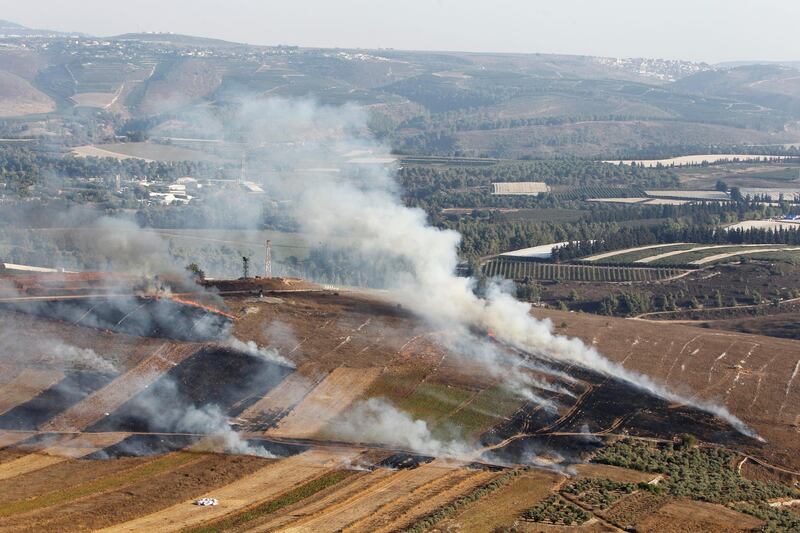 Smoke rises from shells fired from Israel in Maroun Al-Ras village, near the border with Israel, in southern Lebanon, on September 1, 2019. Reuters