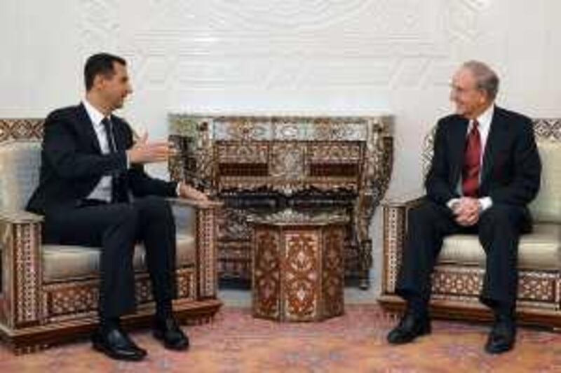  In this photo released by the Syrian official news agency SANA, U.S. Mideast envoy George Mitchell, right, meets with with Syrian President Bashar Assad, left, at the Syrian presidential palace, in Damascus, Syria, on Saturday June 13, 2009.  Mitchell says Syria has an integral role to play in the U.S. effort to forge comprehensive peace in the region, and said the U.S. and Syria share an obligation to help peace negotiations begin "promptly" between Israel, the Palestinians and the broader Arab world.(AP Photo/SANA) ** EDITORIAL USE ONLY ** *** Local Caption ***  DAM102_APTOPIX__Mideast_Syria_US.jpg