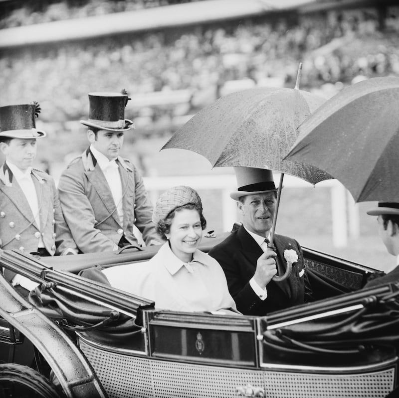Queen Elizabeth II and Prince Philip arrive in a carriage in June, 1969. Getty Images