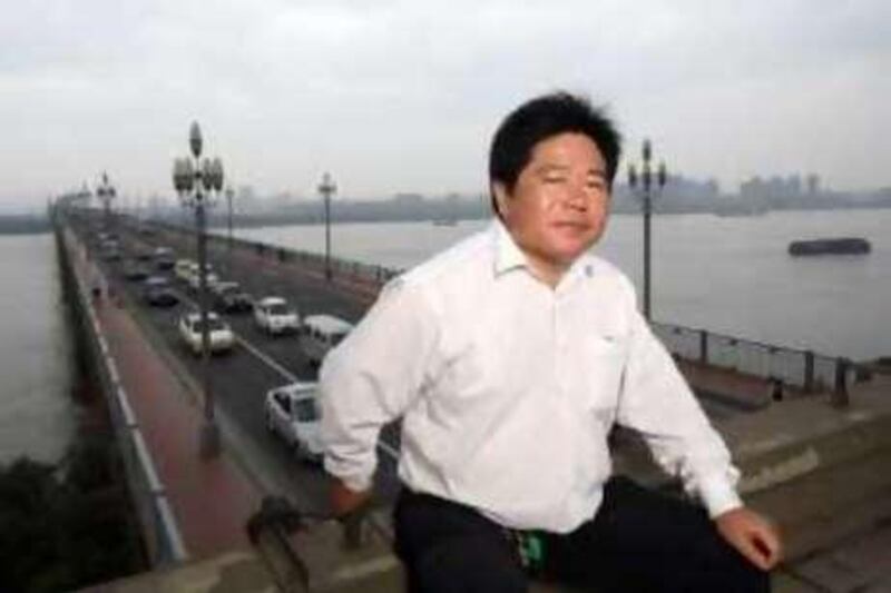 Chen Si, a local activist who tries to prevent suicides on the Nanjing Changjiang Bridge, photographed on the bridge in Nanjing, China on 19 June, 2008.  

Credit: Qilai Shen ( Name Credit Only)

 *** Local Caption ***  QS080619Shanghai024.jpg