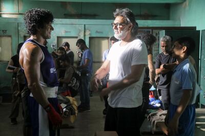 Farhan Akhtar and 'Toofaan' director Rakeysh Omprakash Mehra on set. Courtesy Amazon Prime Video