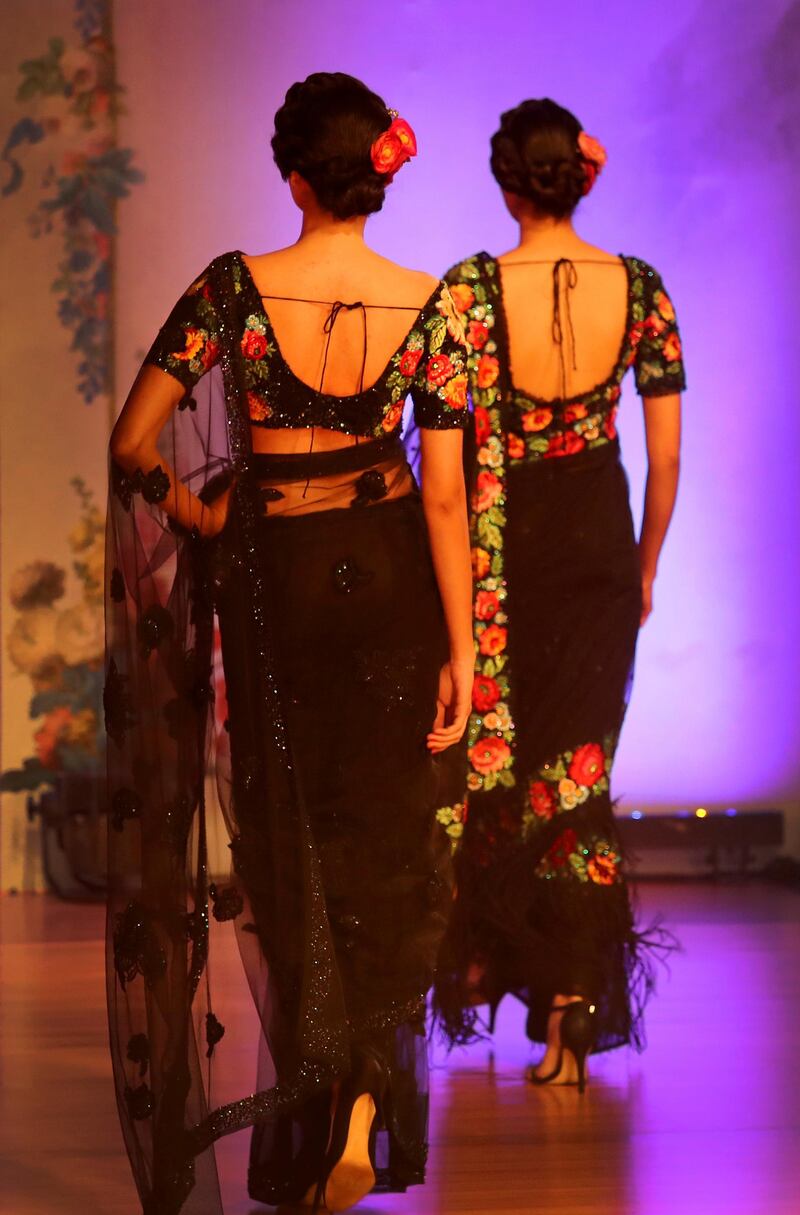 Sari backs are often the most coveted part of the design, and these Pallavi Jaikishan pieces capture the current trend of backless blouses with a thin dori (string) and thickly embroidered border. AP