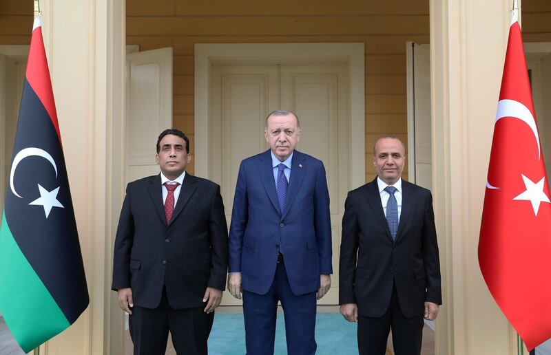 Turkish President Tayyip Erdogan meets with head of Libya's presidency council Mohammed al-Menfi and council member Abdullah al-Lafi in Istanbul, Turkey. Reuters