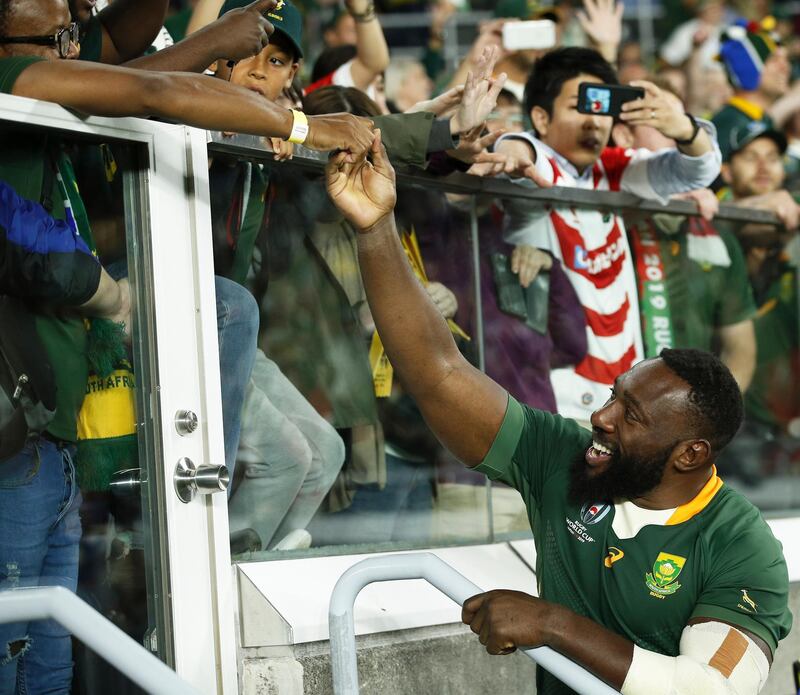 South Africa's Tendai Mtawarira (R) celebrates with supporters after winning the Rugby World Cup 2019 semi final match between South Africa and Wales at the International Stadium Yokohama in Yokohama City, Japan.  EPA