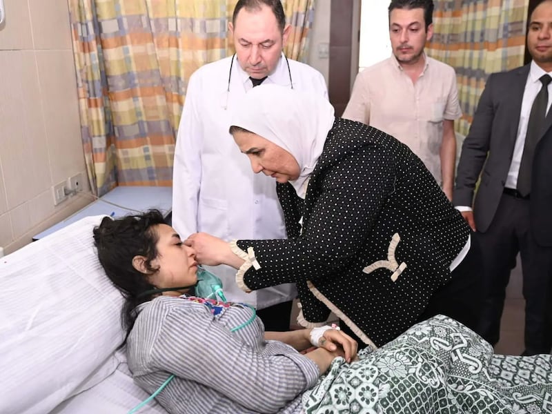 Egypt's Minister of Social Solidarity Nevine El Kabbag visits injured victims. Photo: MOSS