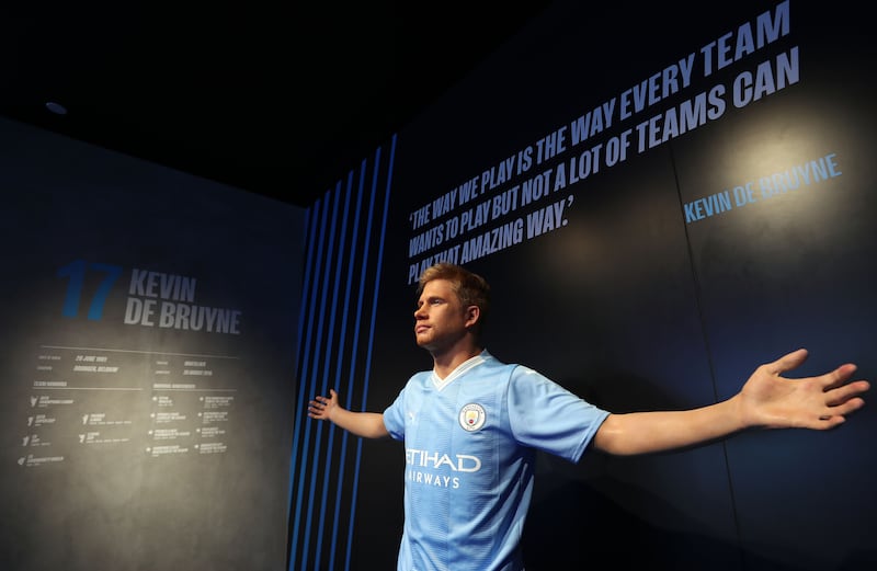 A statue of Manchester City men's team captain Kevin De Bruyne at the new City Challenge attraction.