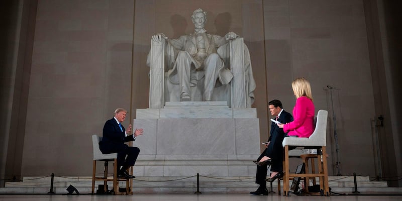 US President Donald Trump speaks during a Fox News virtual town hall 'America Together: Returning to Work', event, with anchors Bret Baier and Martha MacCallum. AFP