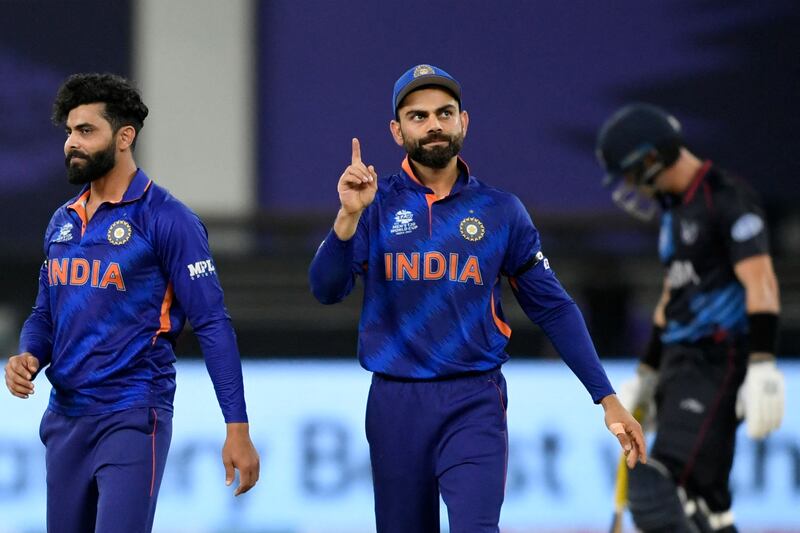 Virat Kohli and Ravindra Jadeja celebrate after the dismissal of Namibia's Stephan Baard. AFP