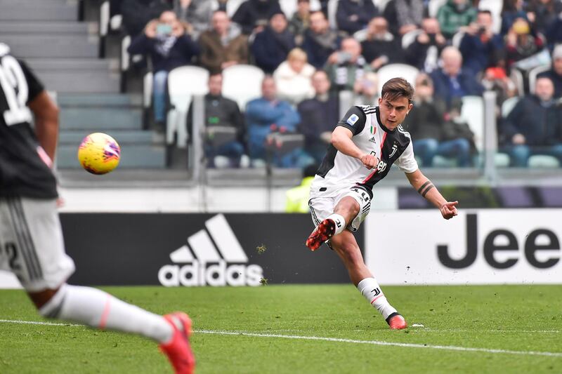 Juventus' Paulo Dybala scores the opening goal against Brescia at the Allianz Stadium on Sunday. AP