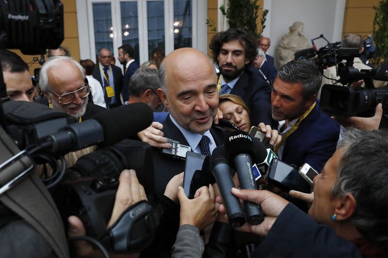 Pierre Moscovici, economic commissioner for the European Union (EU), speaks to members of the media during the Ambrosetti Forum in Cernobbio, Italy, on Saturday, Sept. 2, 2017. Policy makers and business leaders meet at the forum to discuss local and global issues. Photographer: Stefan Wermuth/Bloomberg