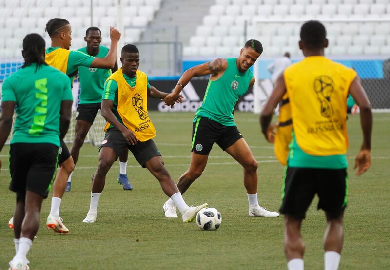 epa06828079 Nigeria players William Troost-Ekong (2nd-R) and Elderson Echiejile (C) in action during Nigeria official training session at the Volgograd Arena in Volgograd, Russia, 21 June 2018. Nigeria will face Iceland  in their first preliminary round Group D match at the FIFA World Cup 2018.  EPA/SERGEI ILNITSKY