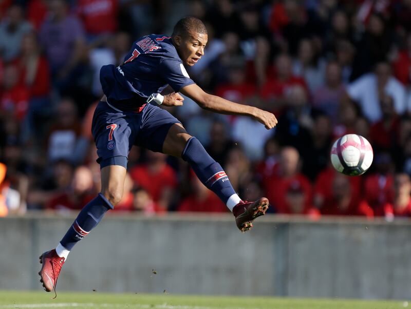 PSG's Kylian Mbappe shoots for goal during a Ligue 1 match against Nimes in 2018. AP